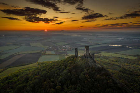 Hazmburk is a mountain peak in the Ceske Stredohori range found in the Czech Republic. At the top of the mountain there is a ruin of a mediaeval castle, of which two towers and some wall fragments.の写真素材
