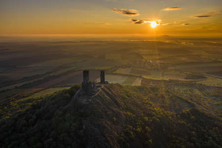 Hazmburk is a mountain peak in the Ceske Stredohori range found in the Czech Republic. At the top of the mountain there is a ruin of a mediaeval castle, of which two towers and some wall fragments.の写真素材