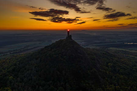 Hazmburk is a mountain peak in the Ceske Stredohori range found in the Czech Republic. At the top of the mountain there is a ruin of a mediaeval castle, of which two towers and some wall fragments.の写真素材