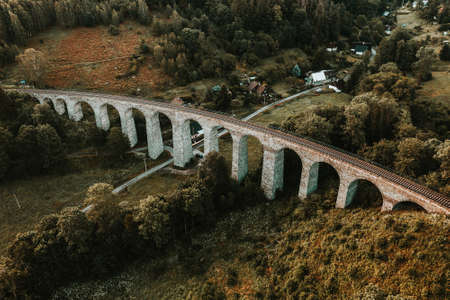 The railway viaduct was built near the village of Novina on the line from Liberec to Ceska Lipa between 1898 and 1900. The viaduct, which has 14 arches, is 230 meters long and approximately 29 meters.の写真素材