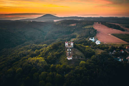 Calvary is 398 m above sea level a high hill and a place of pilgrimage in the district of Litomerice in the Usti nad Labem region. It lies about 0.7 km to the south-east from the village of Ostre.の写真素材