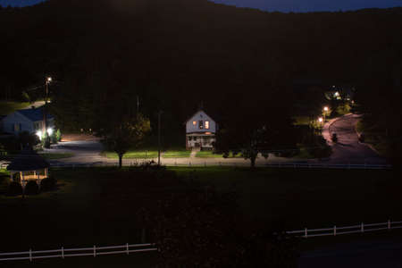 A quiet, country neighborhood prepares for the nightの写真素材