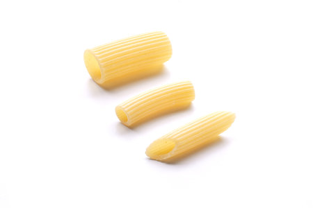 Penne rigate pasta isolated on white background. Top view.の写真素材