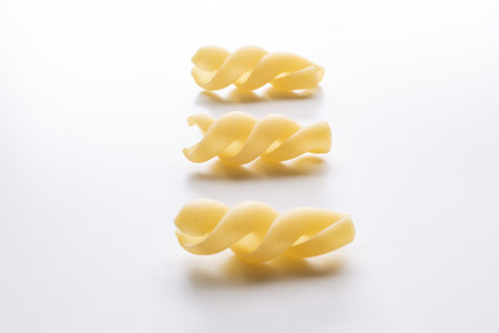Pasta isolated on white background. Raw pasta on white background.の写真素材