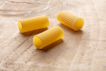 macaroni on wooden tableの写真素材
