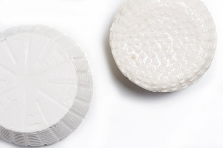Close-up of cheese on a white background. Isolated. top viewの写真素材