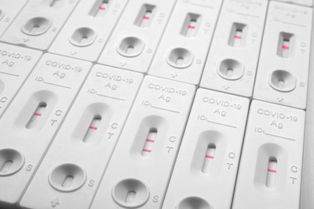 Close up of antigen test strips on a white background. Selective focus.の写真素材
