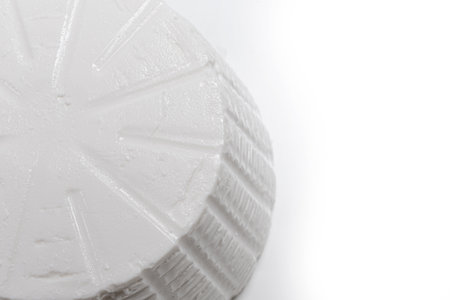 fresh cottage cheese on a white background with a high point of viewの写真素材