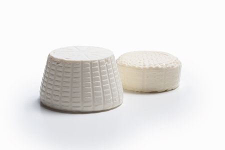 Ricotta and Camembert cheese isolated on a white background. studio shot.の写真素材