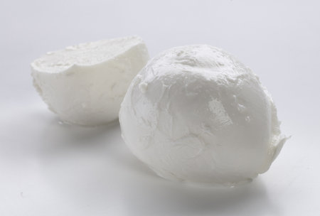 Mozzarella cheese balls on white background, soft focus, close upの写真素材