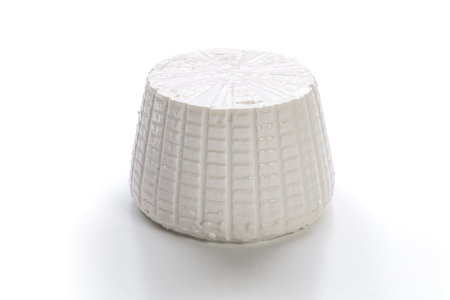 Ricotta cheese isolated on a white background.の写真素材