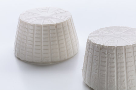 cottage ricotta cheese on a white background shot from a slight angleの写真素材