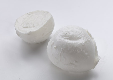 Mozzarella cheese on a white background, close-up.の写真素材