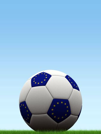 European flag styled football on grass with blue gradient background, with space for textの写真素材