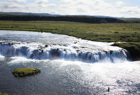Iceland waterfall fishingの写真素材