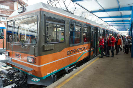 Zermatt, Switzerland, March 04, 2009 - Skiers embark Gornergrat train at Zermatt station. Zermatt is...