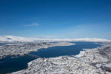 Aerial view to the city of Tromso, 350 kilometers north of the Arctic Circle, Norway.の写真素材
