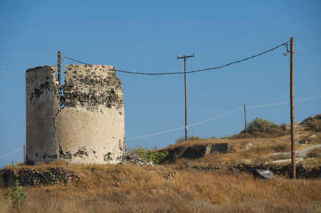 Ruin of ancient windmill at Santorini island, Greece.の写真素材