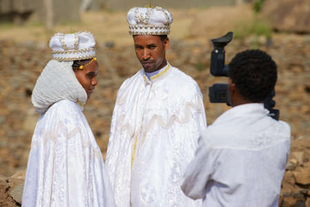 Axum, Ethiopia, January 24, 2010 - People do wedding photography in traditional dresses in Axum, Ethiopia.のeditorial素材