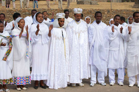 Axum, Ethiopia, January 24, 2010 - People in national dresses applause at traditional wedding ceremony in Axum, Ethiopia.のeditorial素材