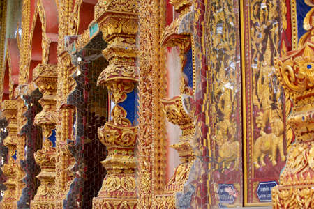 Wat Mani Phraison, Mae Sot, Tak province, Thailand. Outside walls of the temple are covered with thousands of small pieces of glass.の写真素材