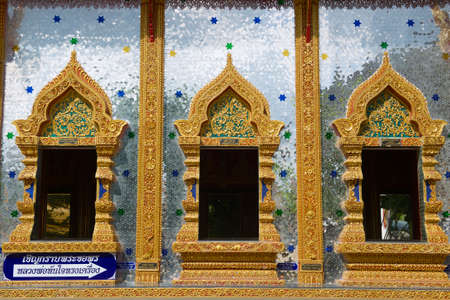 Wat Mani Phraison, Mae Sot, Tak province, Thailand. Outside walls of the temple are covered with thousands of small pieces of glass.の写真素材