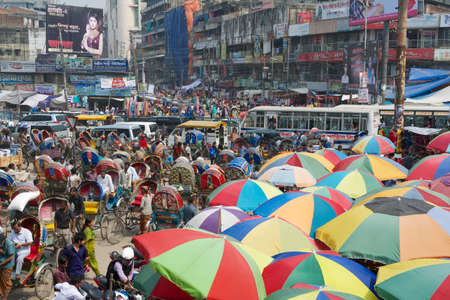 Dhaka, Bangladesh, February 22, 2014 - People go to shopping at the Old market in Dhaka, Bangladesh. Dhaka is one of the most overpopulated cities in the world.のeditorial素材