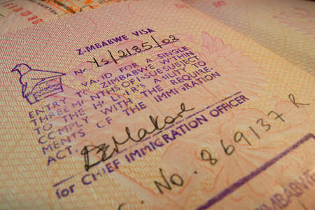 Passport page with Zimbabwe single entry visa stamp.のeditorial素材