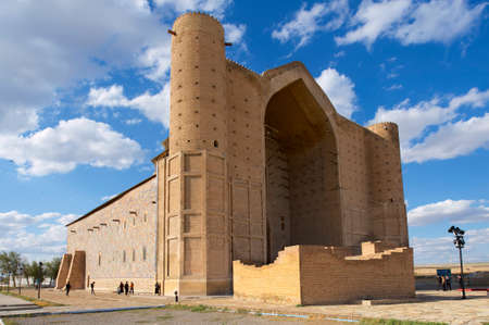 Turkistan, Kazakhstan, September 20, 2011 - People walk around the medieval mausoleum of Khoja Ahmed Yasavi in Turkistan, Kazakhstan. UNESCO World Heritage site.のeditorial素材