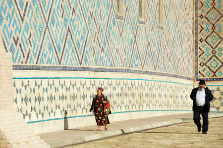 Turkistan, Kazakhstan, September 20, 2011 - People walk around the medieval mausoleum of Khoja Ahmed Yasavi in Turkistan, Kazakhstan. UNESCO World Heritage site.のeditorial素材