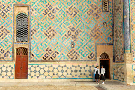 Turkistan, Kazakhstan,  September 20, 2011 - Women explore the medieval mausoleum of Khoja Ahmed Yasavi in Turkistan, Kazakhstan. UNESCO World Heritage site.のeditorial素材