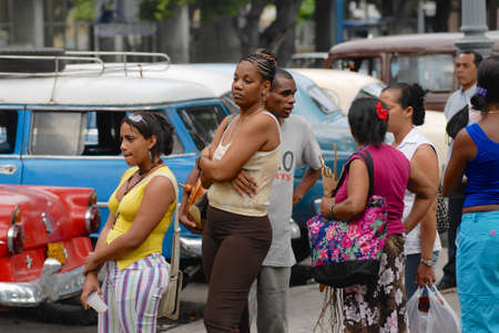 Havana, Cuba, October 23, 2006 - People wait in the queue for taxi in Havana, Cuba. Public transportation in Cuba is at very low level.のeditorial素材