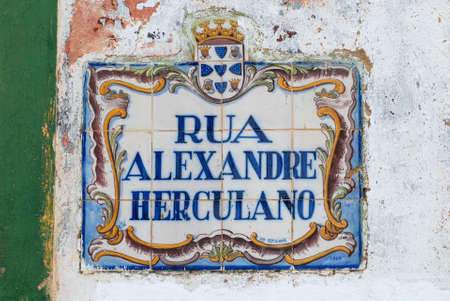 Silves, Portugal - July 18, 2006 : Exterior of the azulejo street name sign in Silves, Portugal. Hand painted tiles (Azulejo) is a traditional art and craft in Portugal.のeditorial素材