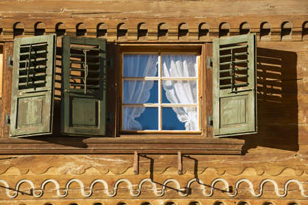 Rougemont, Switzerland - December 09, 2009 : Exterior of the traditional Swiss chalet in Rougemont, Switzerland. Rougemont is a famous tourist destination in Switzerland.のeditorial素材