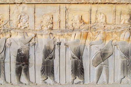 Shiraz, Iran - June 19, 2007 : Bas-relief at the ruins of Persepolis in Shiraz, Iran. Persepolis is a UNESCO World Heritage site.のeditorial素材