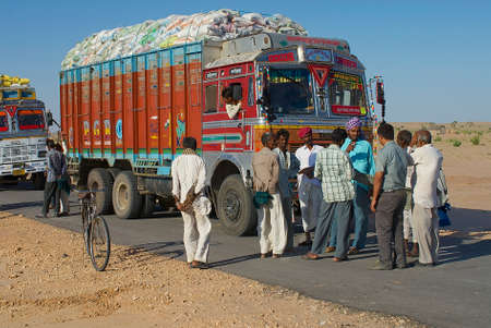 Jamba, India, April 02, 2007 - Truck drivers talk on the road in Jamba, India.