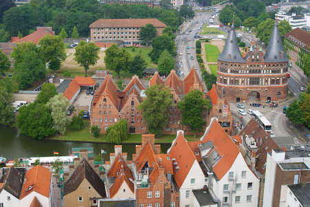 Lubeck, Germany - July 18, 2008 : Aerial view to the old city and Holstentor city gate in Lubeck,...