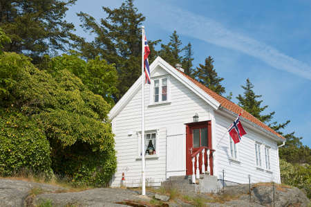 Skudeneshavn, Norway - June 05, 2010 : Exterior of the traditional wooden house in Skudeneshavn, Norway.のeditorial素材