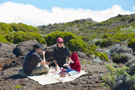 Saint-Paul De La Reunion, France, December 05, 2010 - People have picnic at the Roche Plate volcanic rocks in Saint-Paul De La Reunion, France.のeditorial素材