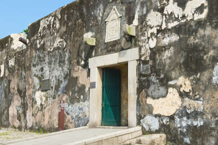 Macau, China - September 11, 2013 : Exterior wall and entrance to the Guia Fortress in Macau, China.のeditorial素材