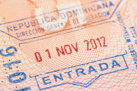 Passport page with Dominican Republic immigration control entry stamp.の写真素材