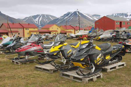 Longyearbyen Norway September January 2011: View to the snowmobiles parked outside for a short arctic summer in Longyearbyen Norway.のeditorial素材