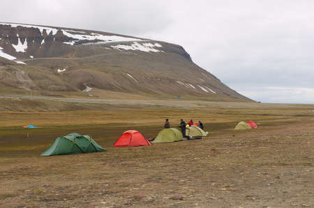 Longyearbyen Norway September January 2011 People set tents for a camp near Longyearbyen Norway.のeditorial素材