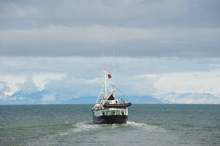 Longyearbyen Norway September March 2011: Ship sails from the harbor of Longyearbyen in Longyearbyen Norway.のeditorial素材