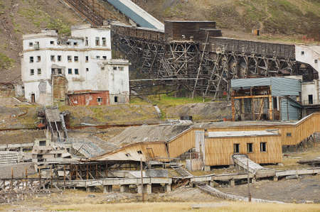 Longyearbyen Norway September March 2011: Exterior of the ruined coal mine in the abandoned Russian arctic settlement Pyramiden Norway.のeditorial素材