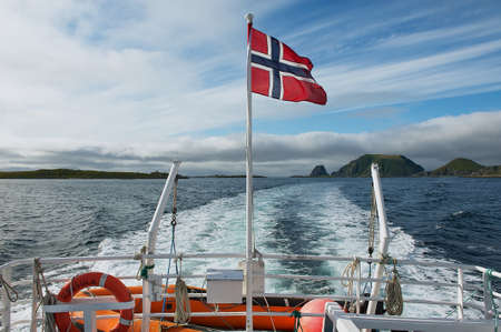 Gjesvaer Norway September May 2011: View to the beautiful sea landscape from the boat at sunset in Gjesvaer Norway.のeditorial素材