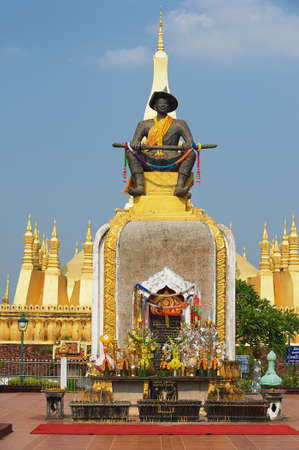 Vientiane, Laos - April 23, 2012: Exterior of the statue of the King Chao Anouvong in front of the Pha That Luang stupa in Vientiane, Laos.のeditorial素材