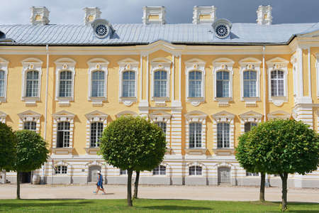 Pilsrundale, Latvia, July 27, 2015 - People walk in front of the Rundale palace facade in Pilsrundale, Latvia.のeditorial素材