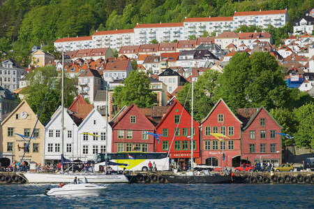 Bergen, Norway - June 06, 2010: View to the Bryggen area with residential buildings at the background in Bergen, Norway.のeditorial素材