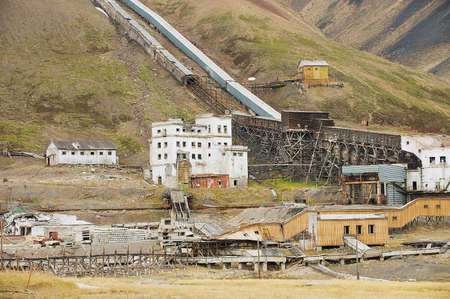 Pyramiden, Norway - September 03, 2011: View to the ruined coal mine in the abandoned Russian arctic settlement Pyramiden, Norway.のeditorial素材
